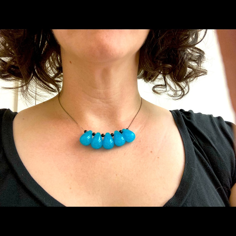 Simple, clean necklace with blue beads